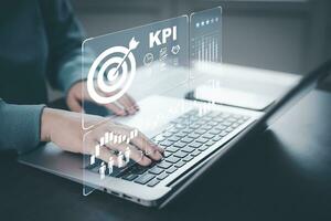 Key Performance Indicator Planning KPI, Company Management Business Internet Technology Concept, Businessman using a laptop with document management, enterprise resource management software system photo
