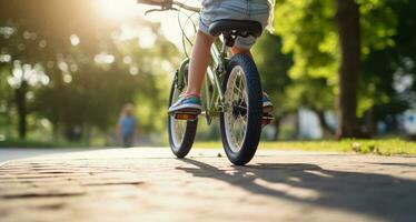 Child learning to ride a bicycle, guardian hands supporting from behind, the thrill of balance. Generative AI photo