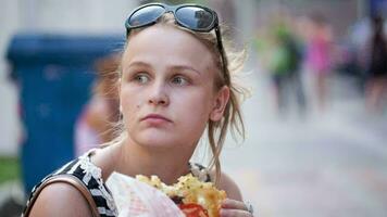 Young woman eating video