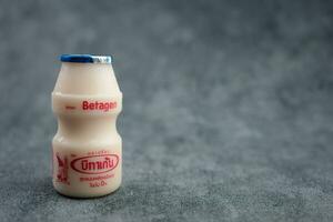 Samut Prakan, Thailand - August 31, 2023 A bottle of Betagen cultured milk drink is a good drink for a healthy digestive system. photo