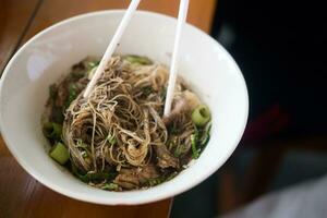 Thai beef clear soup white rice noodle vermicelli with braised beef photo