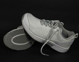 Super New beautiful white sneakers of the elite manufacturer of high quality photo