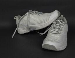 New beautiful white sneakers of the elite manufacturer of high quality. Super cool photo