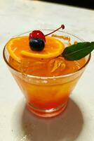 The screwdriver cocktail is a popular and strong drink which is made with zesty orange juice and vodka photo