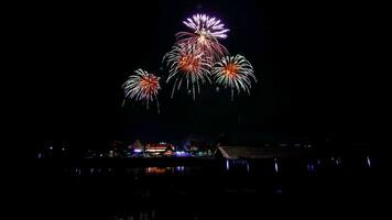 fireworks over the temple in the dark sky photo