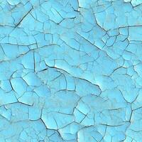 Cracked painted wall seamless texture. Old blue stucco photo