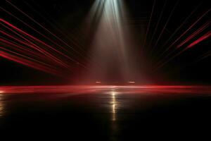 An empty room illuminated by red and white spotlights. Concrete floor, stage photo