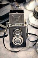 Daugavpils, Latvia 16 09 2023 Vintage Liubitel black camera with two lenses without a case at flea market photo