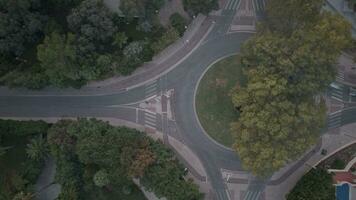 Aerial drone top down timelapse video of roundabout road junction and interchange in Cascais, Portugal