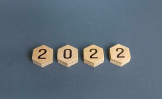 Hexagons with numbers 2022. New Year and Christmas holidays. New plans and goals. Trends ideas. Summing up, drawing conclusions. Next stage. Future. Business planning. Analytics, forecasting photo