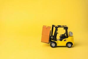 Forklift and boxes. Supply chain optimization. Warehouses, manufacturing facilities, and distribution centers. Inventory accuracy. Efficient logistics and distribution systems. photo