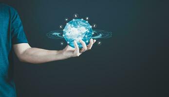 hand of person hold global currency to plan in e-business, the use of online digital network technology in business, buying and selling commerce online digital marketplace photo