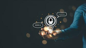 man hold lightblub icon and command prompt ai chat. Big data storage.Digital Artificial Intelligence AI technology disruption concept. We are implementing storage technology support in the business. photo