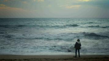 Dancing boy on ocean shore video