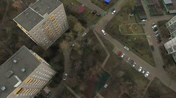 Top aerial view of one of Moscow yard, cloudy weather Urban cityscape from quadrocopter video