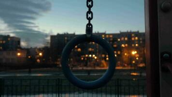 Sports ring on apartment block background in late evening video