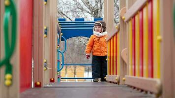 Little boy on playground equipment video