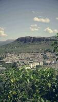 Vertical video of Alcala La Real, Spain. City from above.