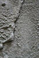 Uneven cement and sand wall texture background, grungy cement wall surface, rustic sand wall photo