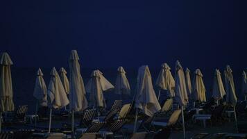 Empty beach at night and coming storm video