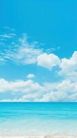 Dreamy beach with blurred ocean waves and sky photo