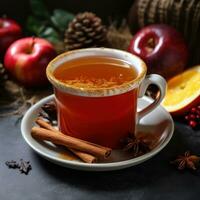 Spiced apple cider served warm in a cozy mug photo