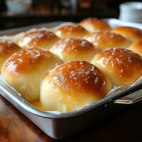 Fluffy dinner rolls with a perfect golden-brown crust photo