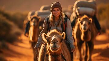 Tourists Delight in Group Camel Rides through the Desert Travel photo