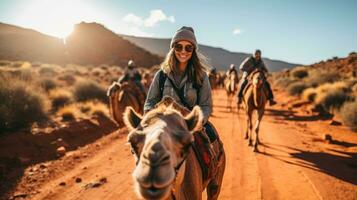 Tourists Delight in Group Camel Rides through the Desert Travel photo