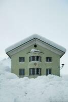 a building covered in snow photo