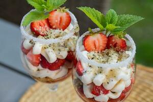 Strawberries with mascarpone and hemp crackers photo
