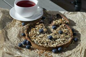 Buckwheat crostata with blueberry marmelade photo