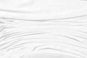 Top view Abstract White cloth background with soft waves.Wave and curve overlapping with different shadow of color,white fabric, crumpled fabric. photo