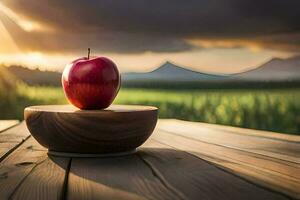 un manzana se sienta en un de madera mesa en frente de un campo. generado por ai foto