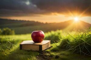 apple on a book in the field. AI-Generated photo