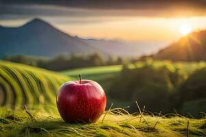 un manzana se sienta en un herboso ladera con un puesta de sol en el antecedentes. generado por ai foto