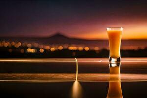 a glass of orange juice sitting on a table in front of a city skyline. AI-Generated photo