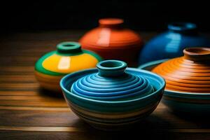 colorful ceramic bowls on a wooden table. AI-Generated photo