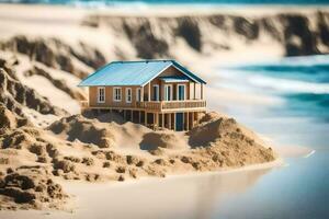 a miniature house sits on top of a sand dune. AI-Generated photo