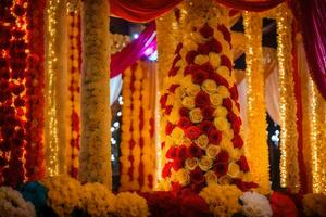 a colorful wedding stage decorated with flowers and garlands. AI-Generated photo