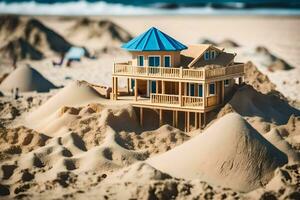 a miniature house on the beach with sand. AI-Generated photo