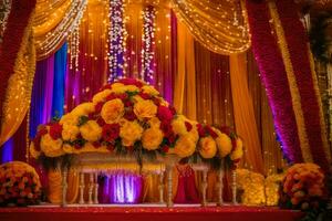 a colorful wedding stage with flowers and garlands. AI-Generated photo