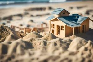 a miniature house on the beach with sand. AI-Generated photo