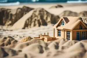 a model house sits on the sand in front of a beach. AI-Generated photo