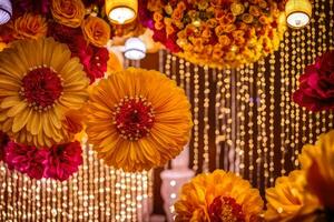 a wedding reception with colorful flowers and lights. AI-Generated photo