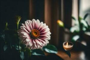 a flower and candle on a window sill. AI-Generated photo