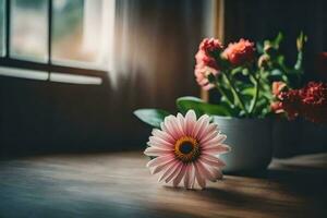 un rosado flor se sienta en un florero en un mesa cerca un ventana. generado por ai foto