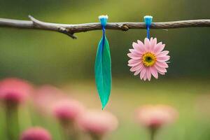 a pink flower and green feather on a branch. AI-Generated photo