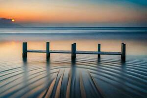 un muelle en el Oceano a puesta de sol. generado por ai foto