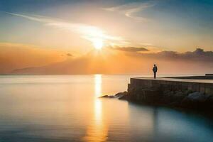 a man standing on a dock looking at the sun setting over the water. AI-Generated photo